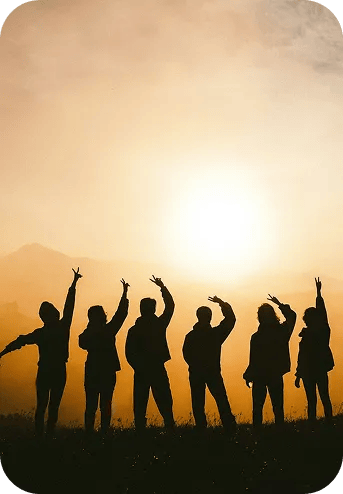 Travelers silhouettes at sunset