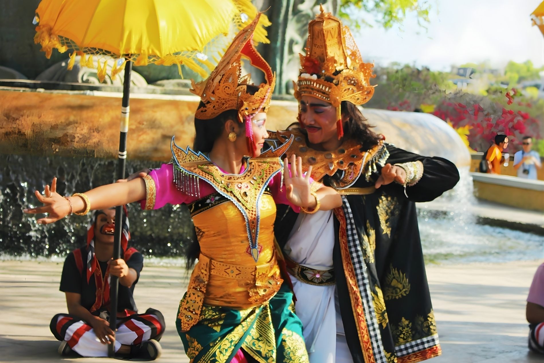 Legong dance performed during the Bali Arts Festival, with traditional Balinese costumes and an open-air cultural stage.